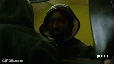 Two Men In Hooded Jackets GIF
