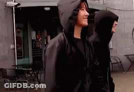 Two Men In Hooded Jackets GIF