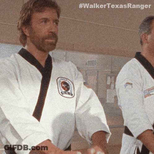 Two Men In Karate Uniforms Are Standing Next To Each Other With #Walkertexasranger Written On The Bottom Right GIF