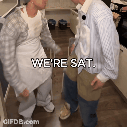 Two Men In Kitchen Saying We're Sat GIF