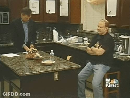 Two Men In Kitchen With NBC Logo GIF