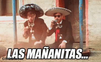Two Men In Mariachi Outfits Drinking And Smoking GIF