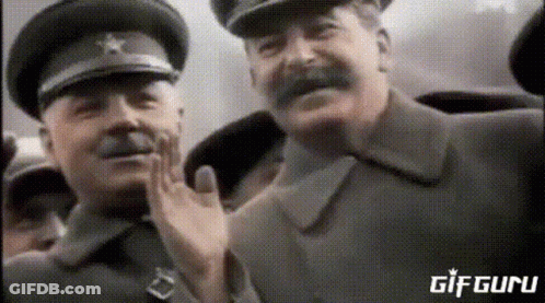 Two Men In Military Uniforms GIF
