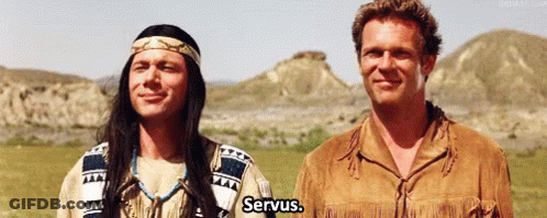 Two Men In Native American Costumes Saying Servius GIF