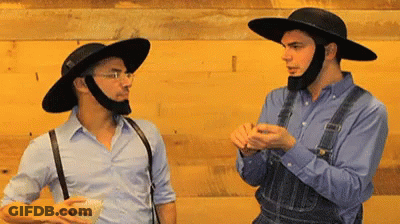 Two Men In Overalls And Hats GIF