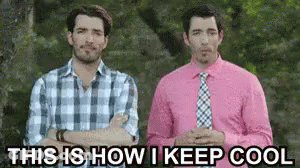 Two Men In Plaid Shirts And Ties Talking GIF