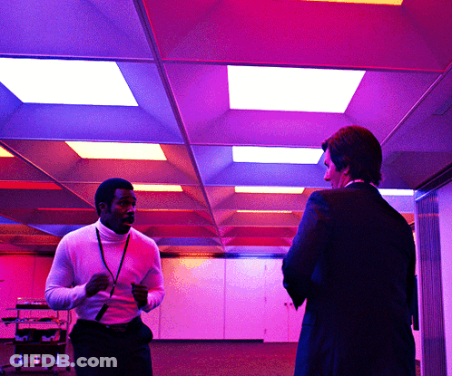 Two Men In Purple Lights GIF