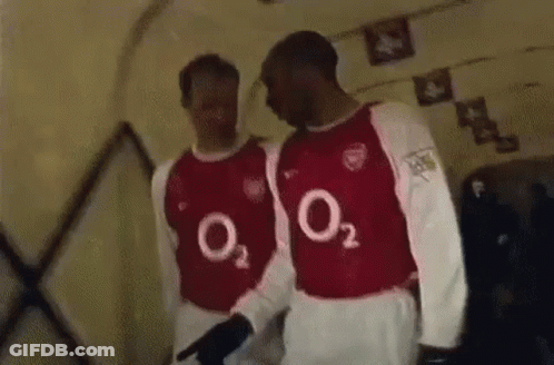 Two Men In Red And White Jerseys With O2 GIF