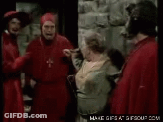 Two Men In Red And White Robes GIF