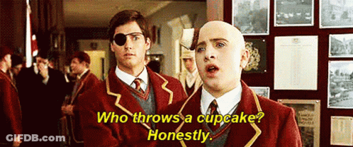 Two Men In School Uniforms One With Eye Patch GIF