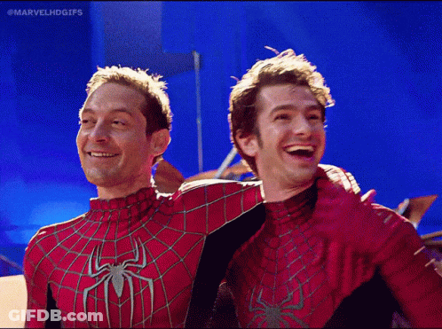 Two Men In Spiderman Costumes Are Posing For A Photo With The Caption Marvelhdgifs GIF