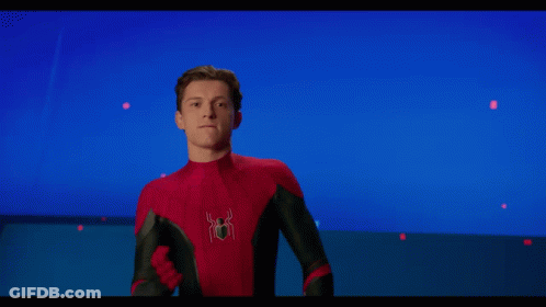 Two Men In Spiderman Costumes Are Posing For A Picture Together GIF