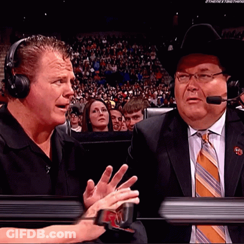Two Men In Suits And Cowboy Hats Talking In Front Of Crowd GIF