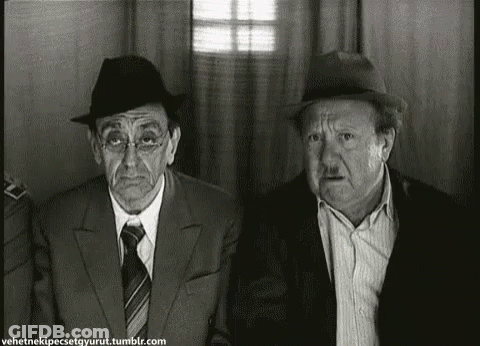 Two Men In Suits And Hats In Black And White Photo GIF