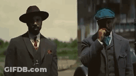 Two Men In Suits And Hats GIF