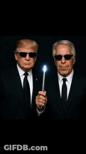 Two Men In Suits And Sunglasses Holding A Light GIF