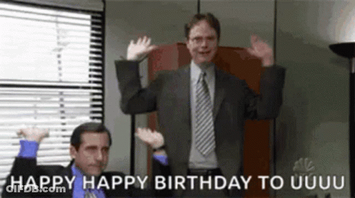 Two Men In Suits And Ties Are Dancing In An Office With The Words Happy Happy Birthday To Uuuu On The Bottom . GIF