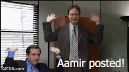Two Men In Suits And Ties Are Dancing In Front Of A Window With The Words Aamir Posted . GIF