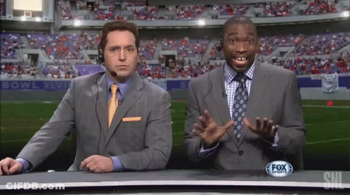 Two Men In Suits And Ties Are On Fox Sports GIF