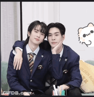 Two Men In Suits And Ties Are Posing For A Picture With A Cat On The Wall GIF