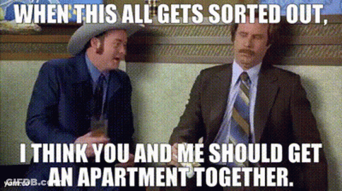 Two Men In Suits And Ties Are Sitting Next To Each Other And Talking . One Of The Men Is Wearing A Cowboy Hat . GIF