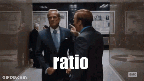 Two Men In Suits And Ties Are Standing In A Hallway And The Word Ratio Is On The Wall Behind Them GIF