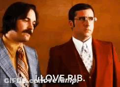 Two Men In Suits And Ties Are Standing Next To Each Other . One Of The Men Is Saying `` I Love Rub '' . GIF