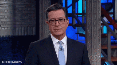 Two Men In Suits And Ties Drinking Coffee Saying Bravo GIF
