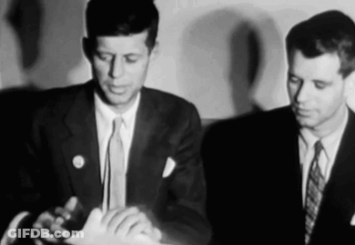 Two Men In Suits And Ties GIF