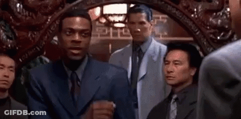 Two Men In Suits And Ties Talking GIF