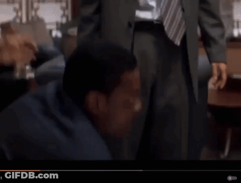 Two Men In Suits And Ties Talking GIF