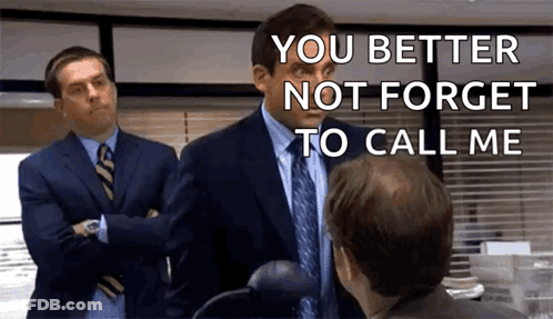 Two Men In Suits And Ties Talking GIF