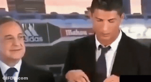 Two Men In Suits And Ties GIF