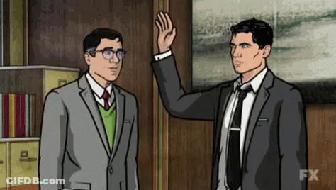 Two Men In Suits And Ties Waving Hand GIF