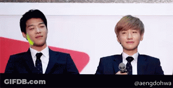 Two Men In Suits And Ties With Name Aengdohwa GIF