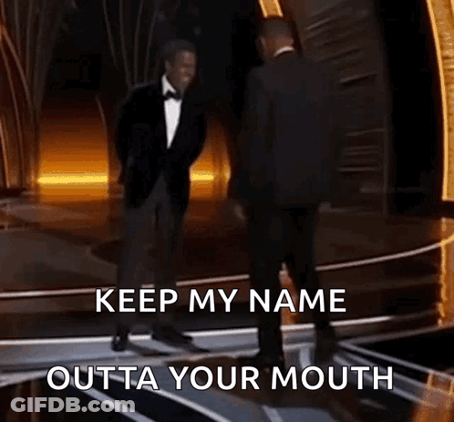 Two Men In Suits Are Dancing On A Stage With The Words Keep My Name Outta Your Mouth Written Below Them GIF