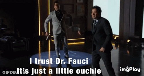 Two Men In Suits Are Dancing With The Words I Trust Dr. Fauci It 'S Just A Little Ouchie Below Them GIF