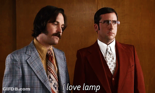 Two Men In Suits Are Standing Next To Each Other And One Of Them Says I Love Lamp GIF
