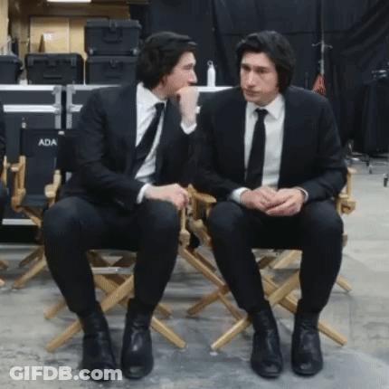 Two Men In Suits In Director's Chairs Ada GIF