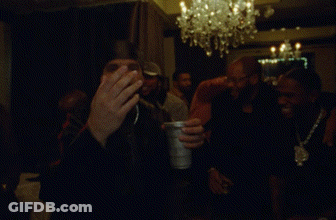Two Men In Suits In The Dark GIF