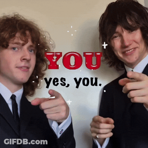 Two Men In Suits Pointing At The Camera With The Words You Yes You GIF