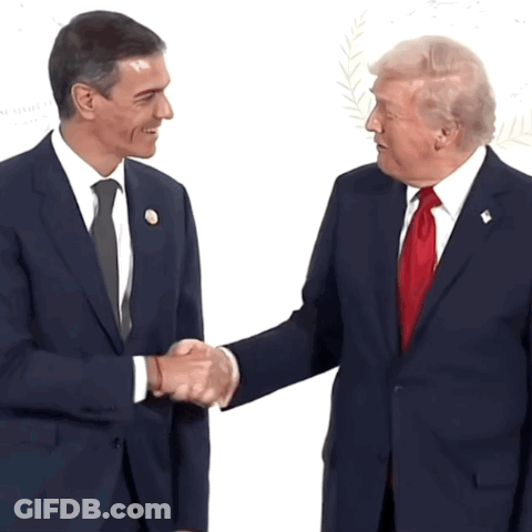 Two Men In Suits Shaking Hands GIF