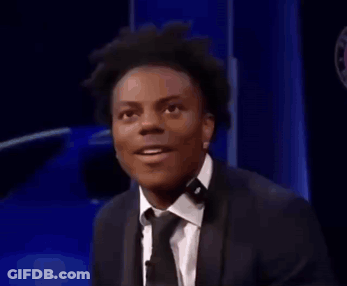 Two Men In Suits Sitting At Table GIF