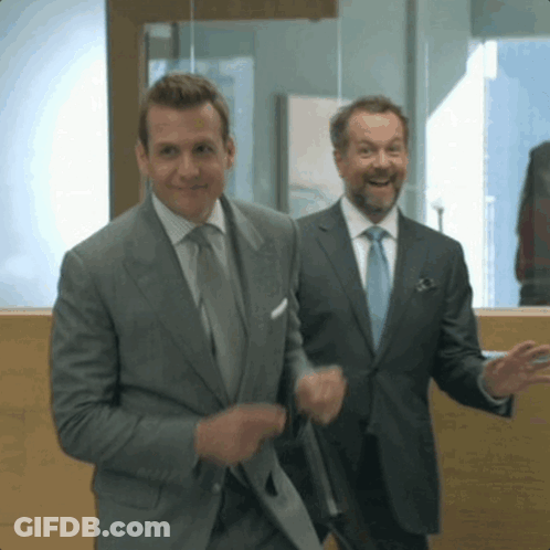 Two Men In Suits Smiling GIF