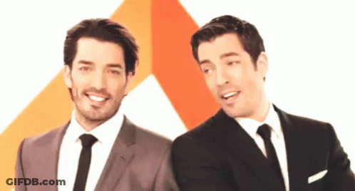 Two Men In Suits Smiling GIF