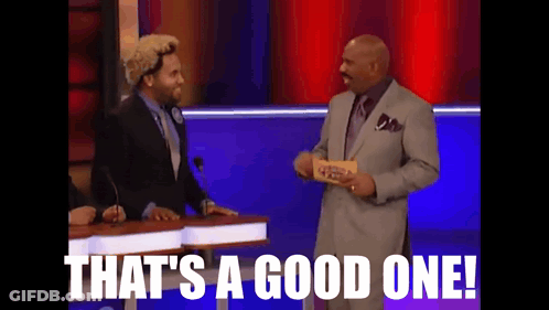 Two Men In Suits Standing Together GIF