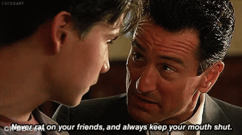 Two Men In Suits Talking GIF