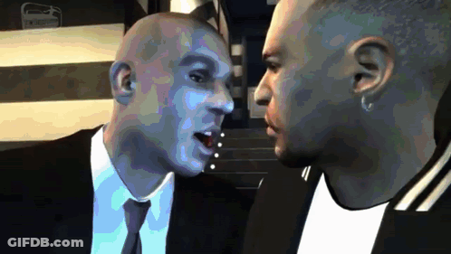 Two Men In Suits Talking GIF