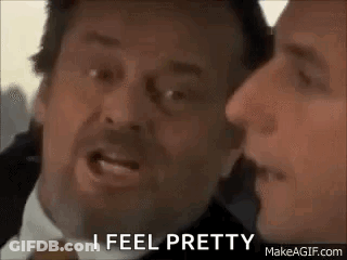 Two Men In Suits Talking GIF