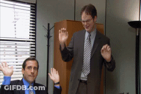 Two Men In Suits Waving Hands GIF